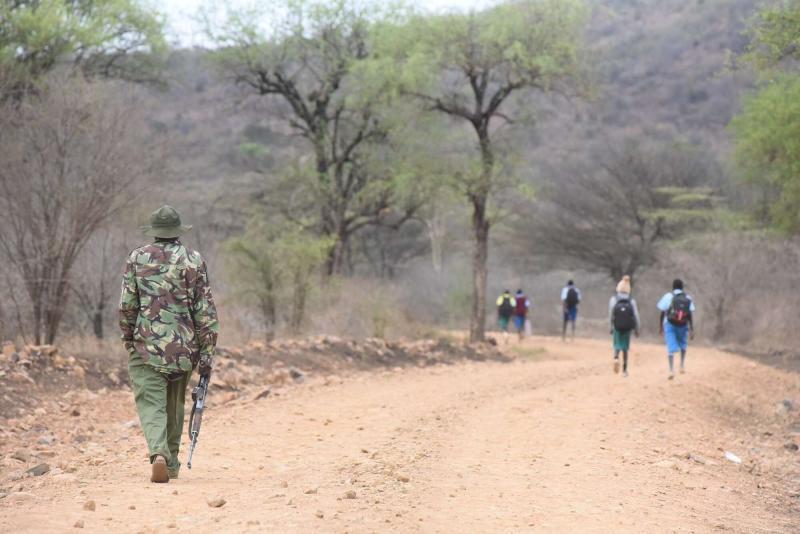File image of police escorting students to school.